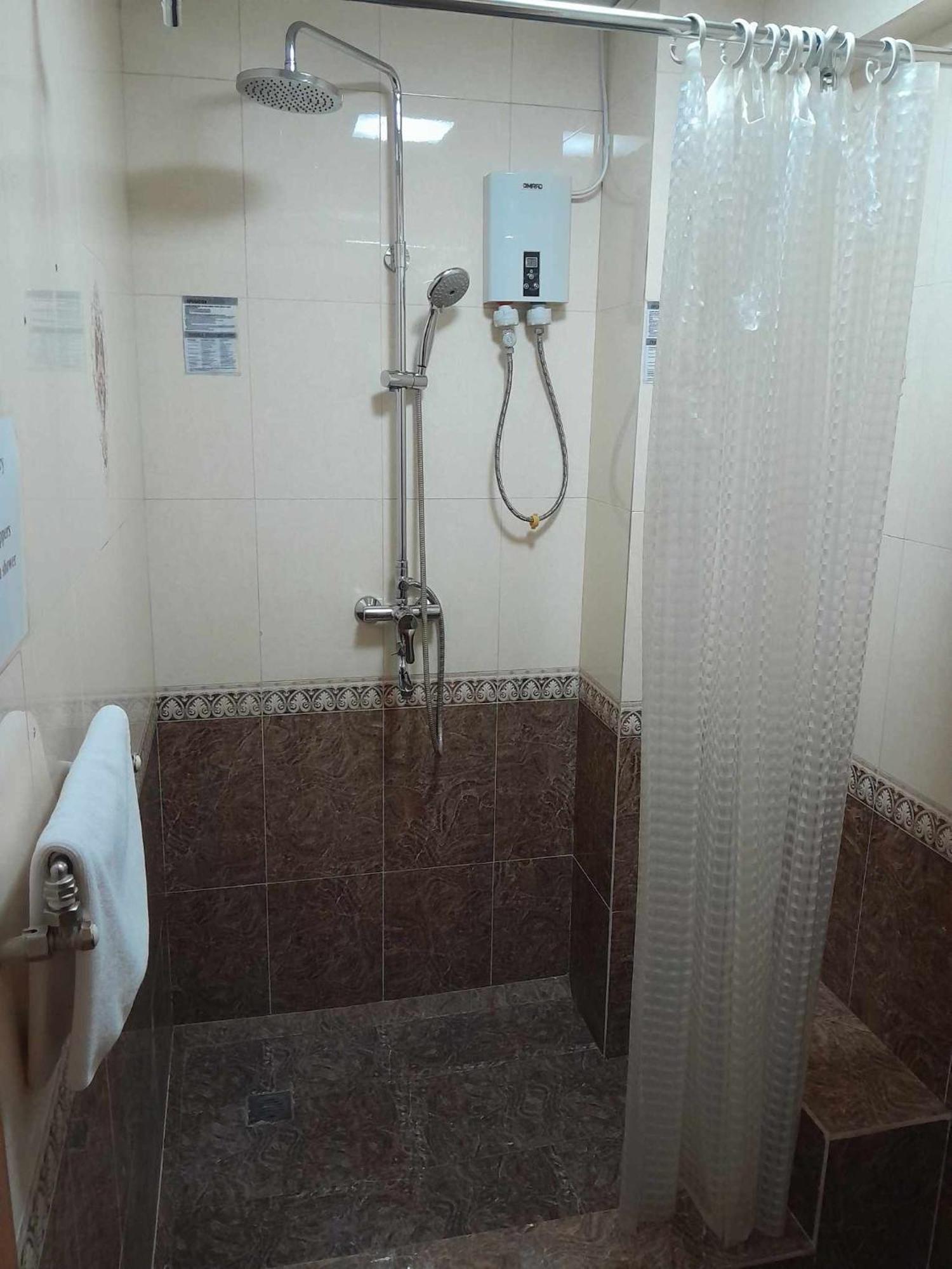 Tanan Center Serviced Apartments أولان باتور الغرفة الصورة